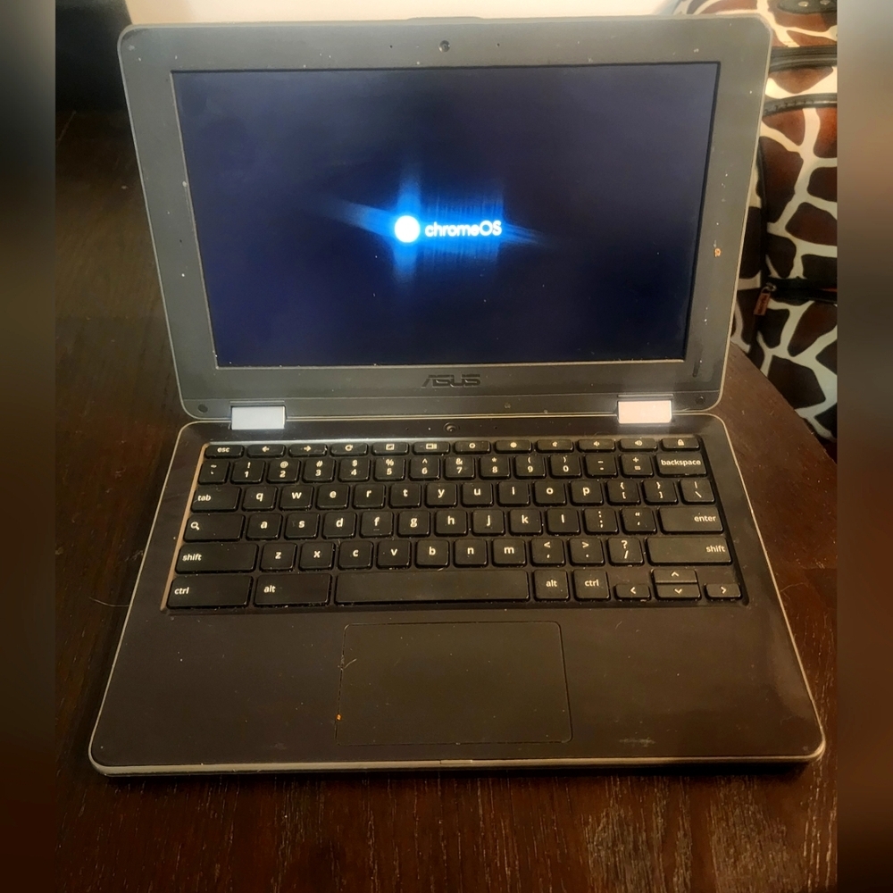 ASUS Black Laptop with Backlit Keyboard and Slim Profile